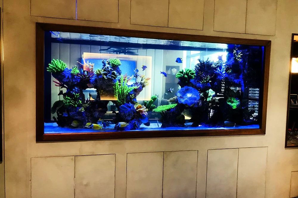 How to Choose an Aquarium Company in Dubai: 12 Questions to Ask 1 Aquarium installed in a panelled majlis wall