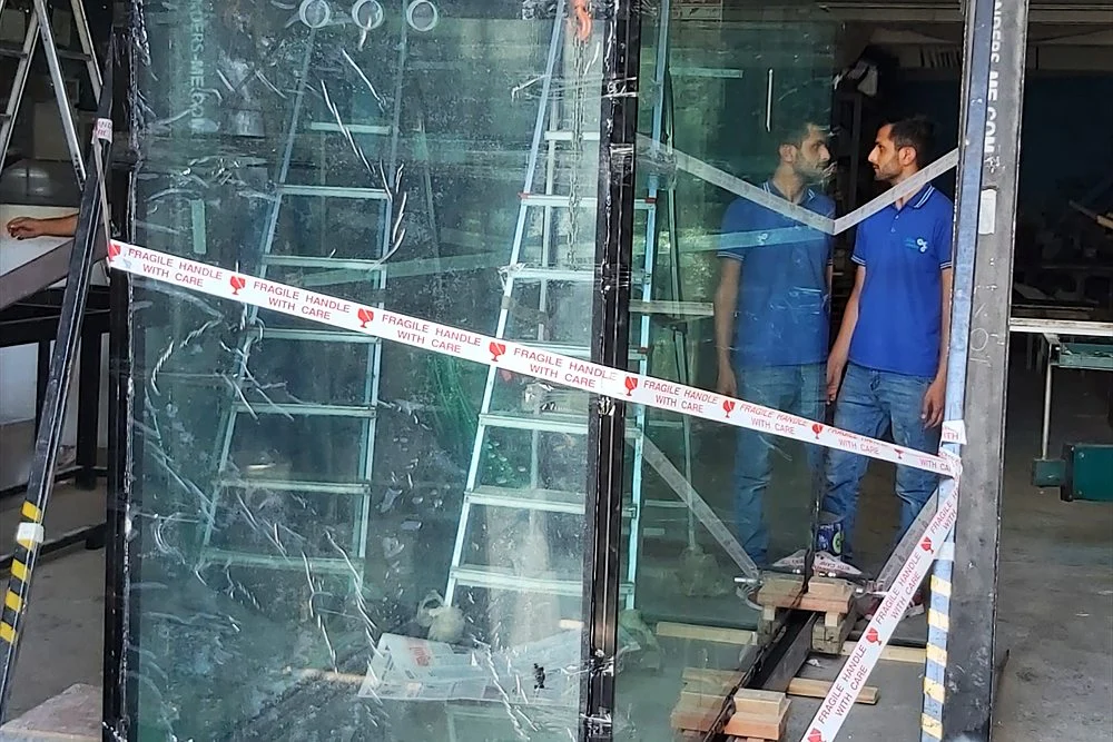 Inside Our Al Qusais Aquarium Workshop in Dubai 2 Glass aquarium panels positioned during fabrication