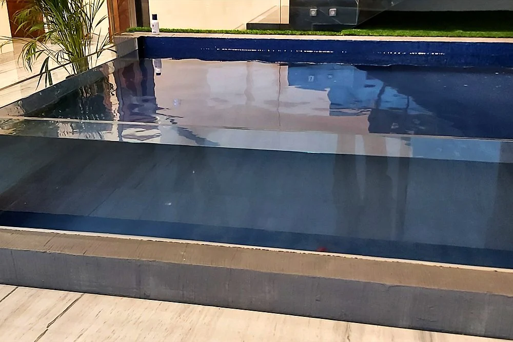 Indoor Koi Pond: Design, Humidity Control and Safety 2 Indoor pool with a clear acrylic side wall