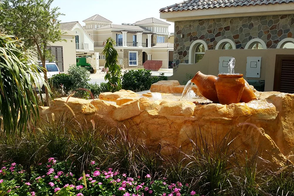 Water Feature Ideas for Dubai Villa Gardens 2 Layered sandstone waterfall in a villa front garden