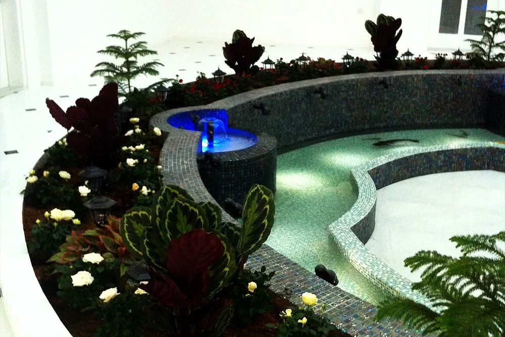 Indoor Koi Pond: Design, Humidity Control and Safety 1 Planted indoor pool with mosaic edging and blue lighting