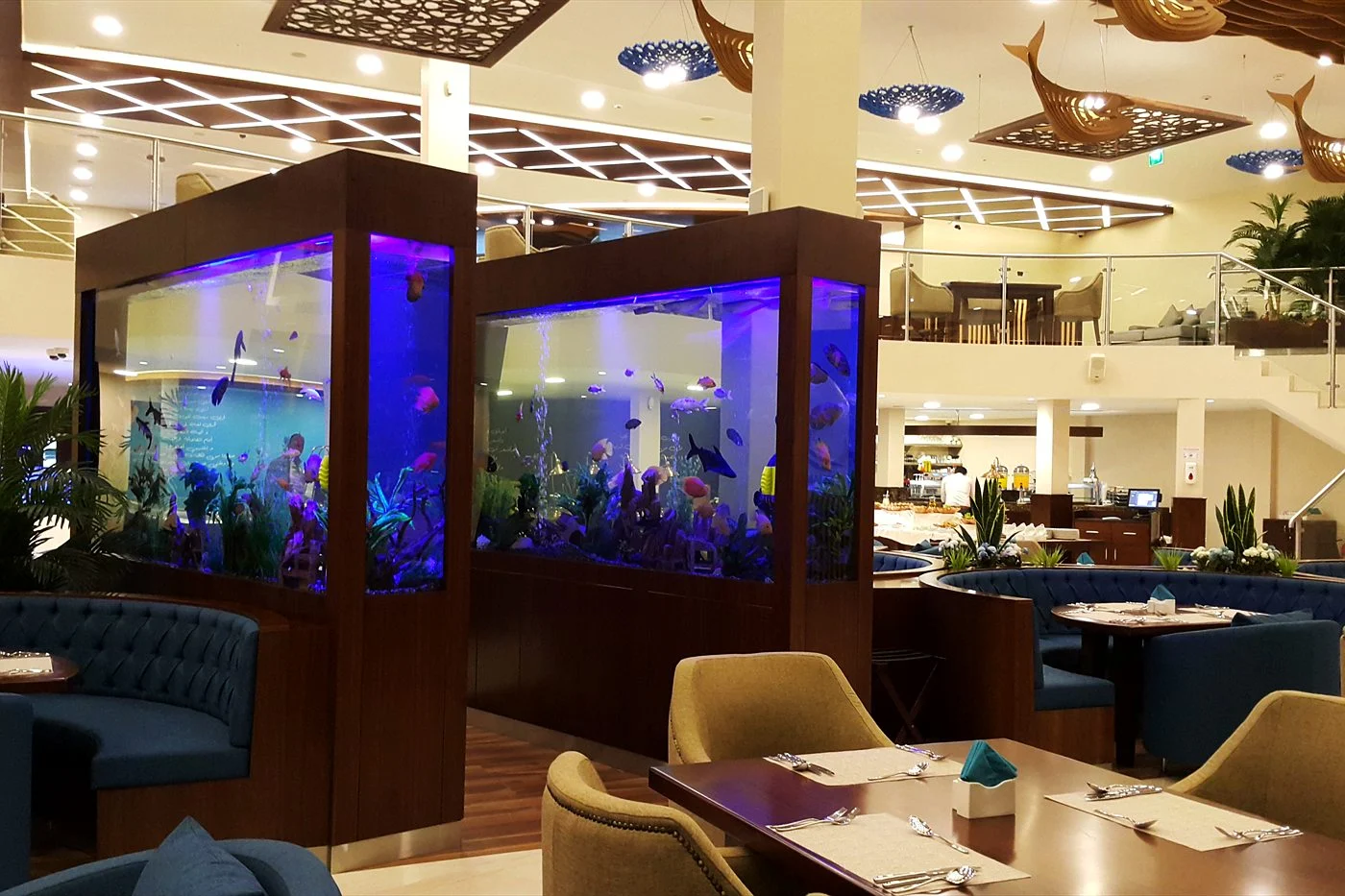 Restaurant partition aquariums in a Dubai dining room