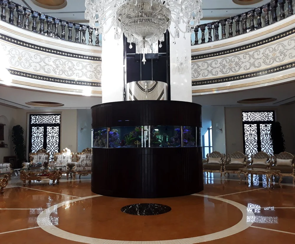 Cylinder & Column Aquariums: Luxury Statement Tanks 1 Round aquarium column in a grand villa hall